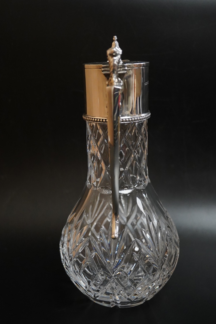 An Elizabeth II silver mounted cut glass claret jug, by J. Bros, Sheffield, 1978, height 28.5cm.